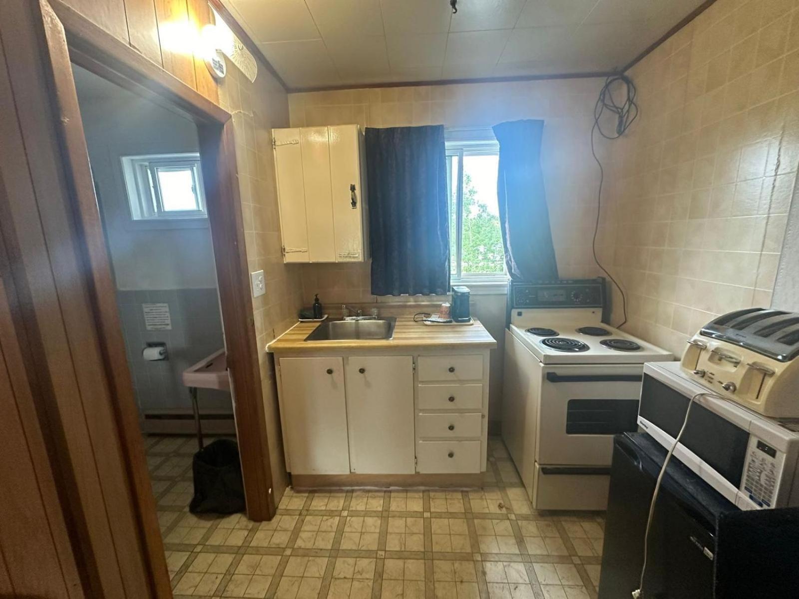 Pine Ridge Motel Тимминс Экстерьер фото